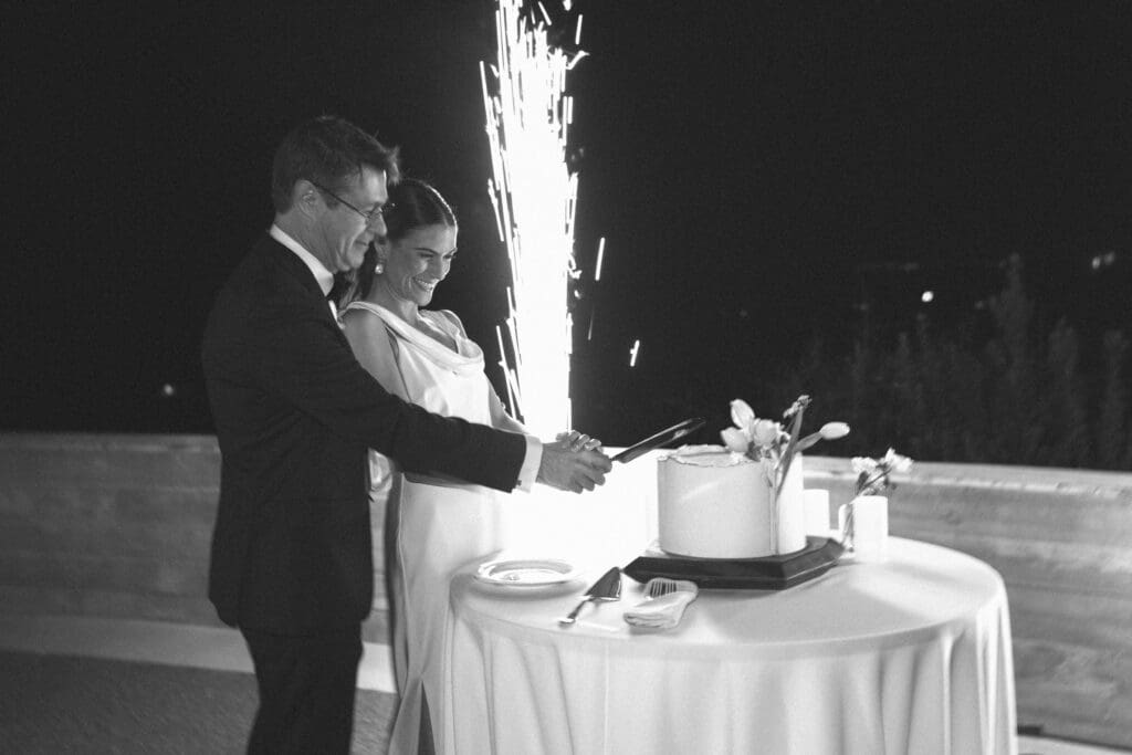 alila marea wedding cake cutting on the outdoor terrace