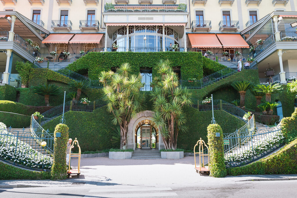 Grand Hotel Tremezzo wedding venue on Lake Como, with its Belle Epoque facade above terraced gardens and palms