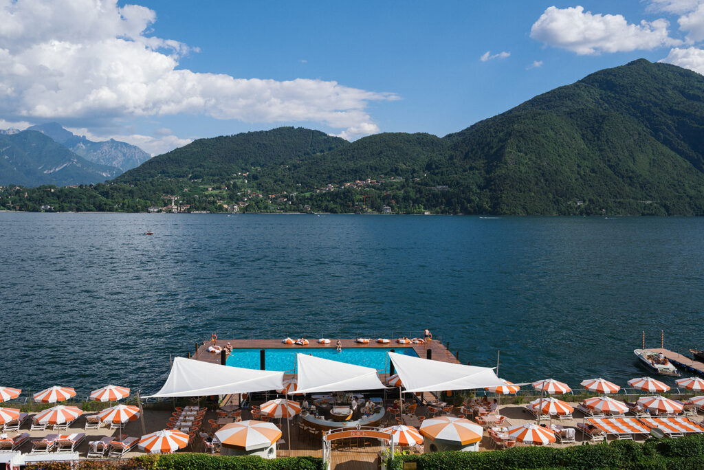 Lake Como view over T Beach and its lakeside pool, a setting for a grand hotel tremezzo wedding weekend